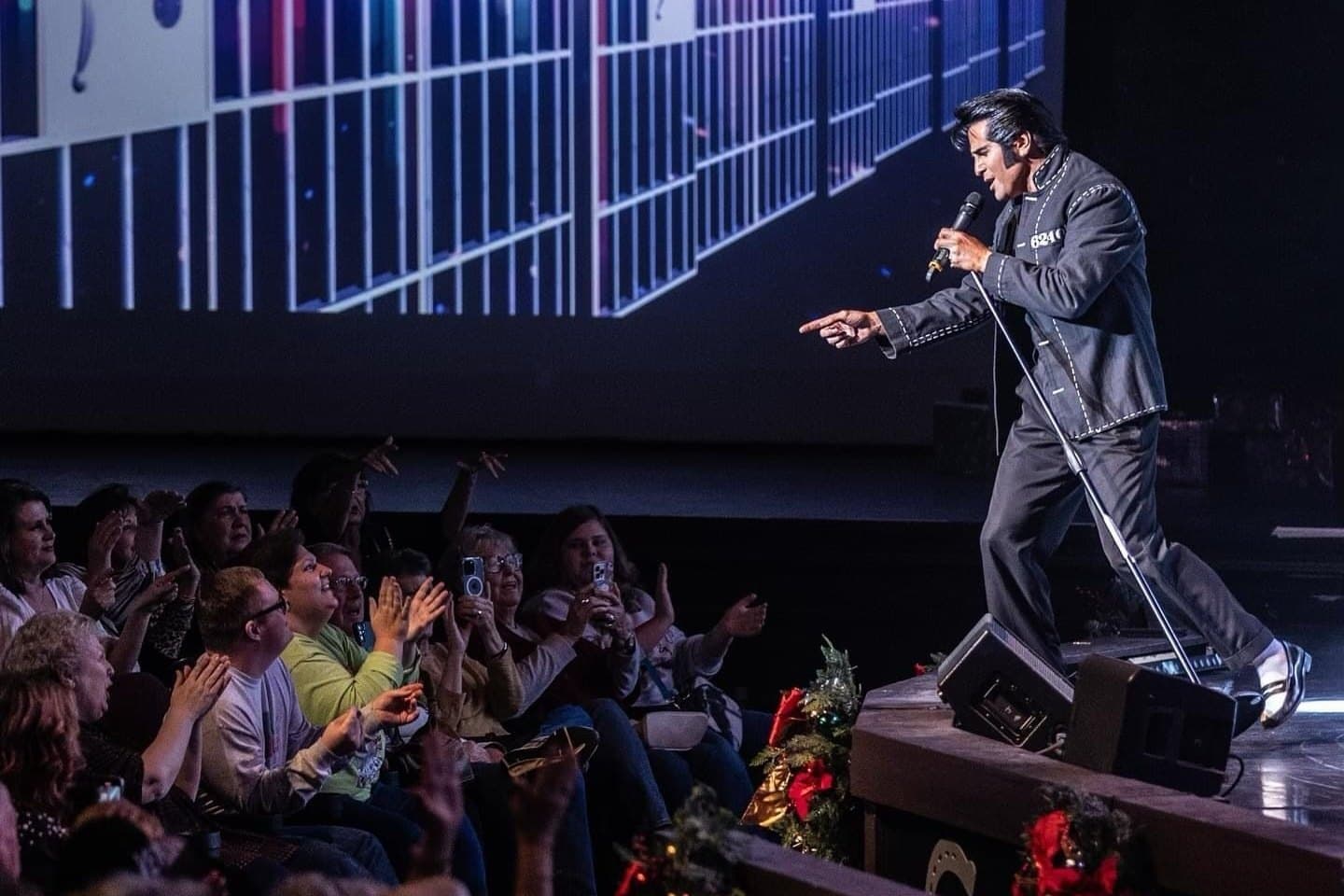 Dean Z performing as Elvis on stage at the Clay Cooper Theatre in Branson