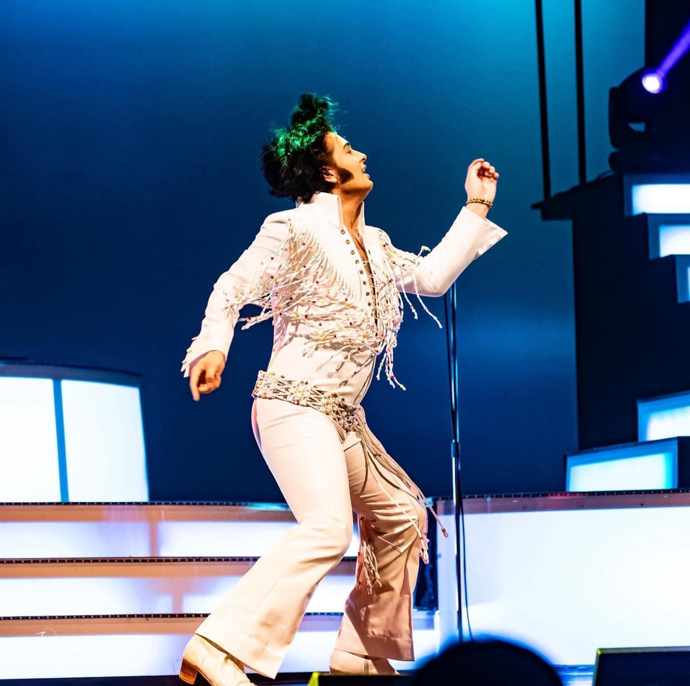 Elvis: Story of a King performers under the stage lights in Branson