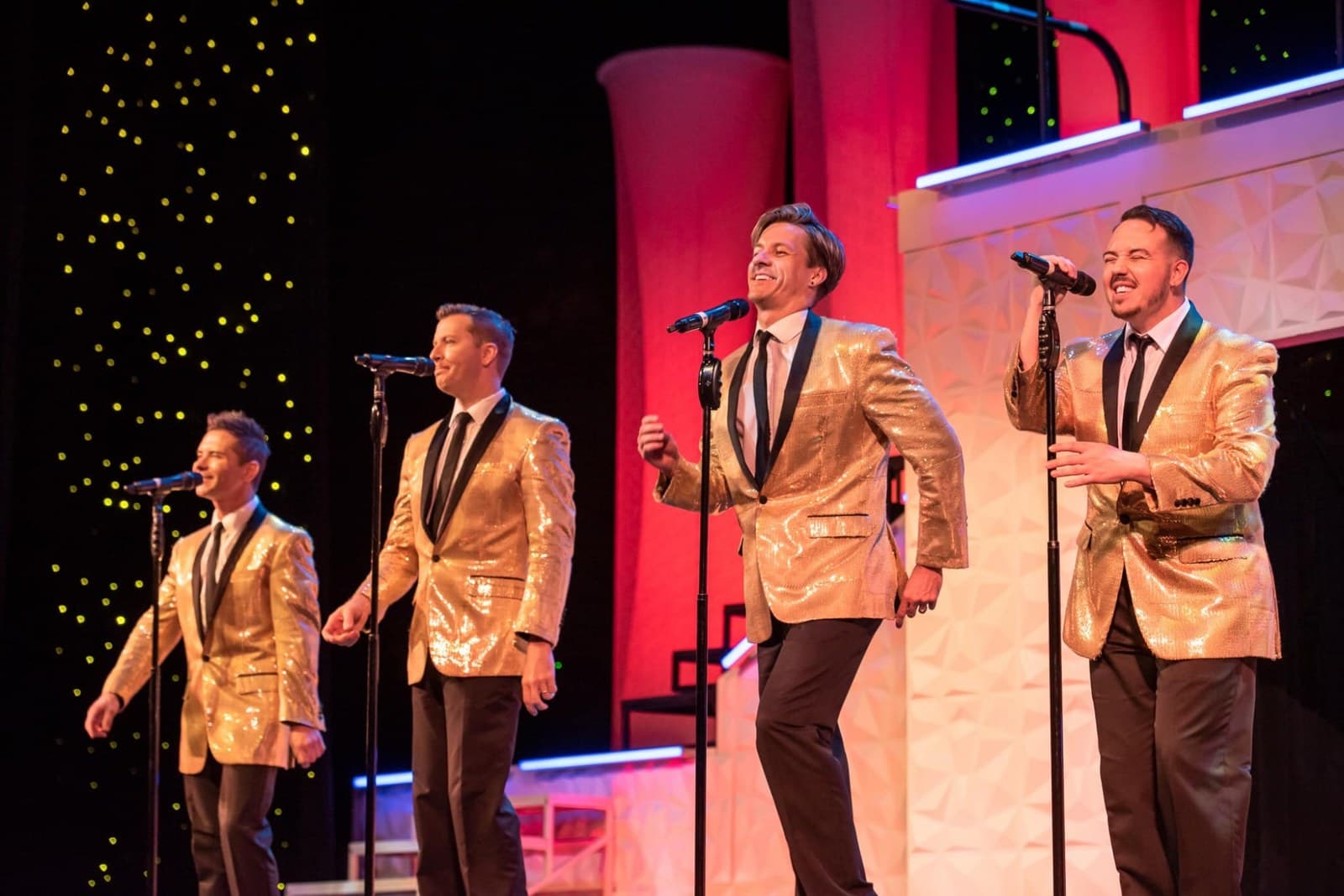 New Jersey Nights cast in gold jackets singing Four Seasons hits at King's Castle Theatre in Branson